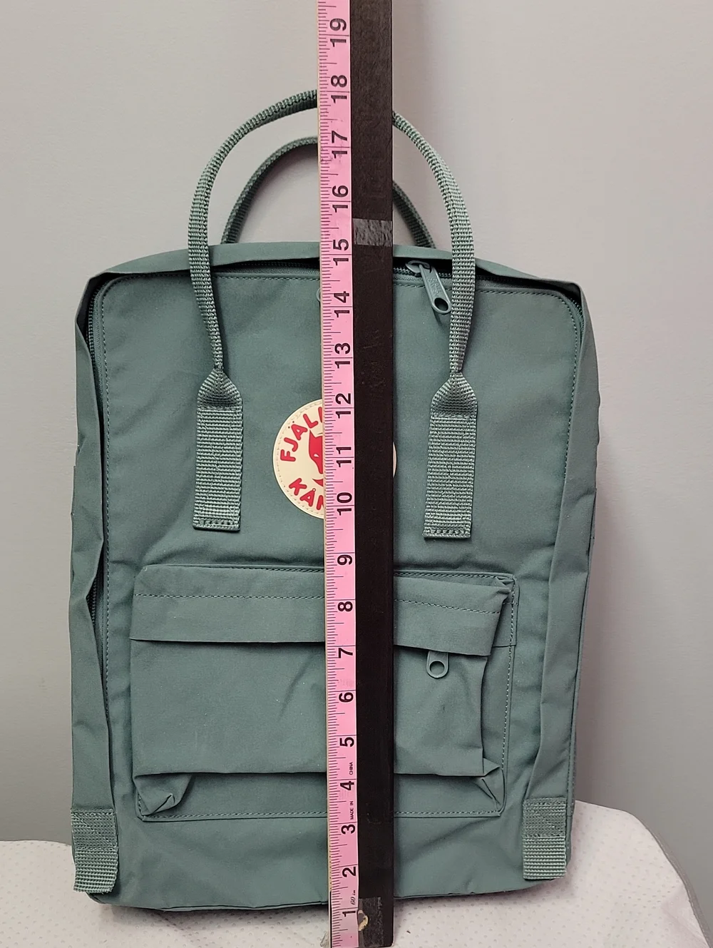 Fjallraven Kanken Backpack in Teal with Red Logo
